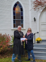 QAHN makes financial contribution to Georgeville HS's church purchase