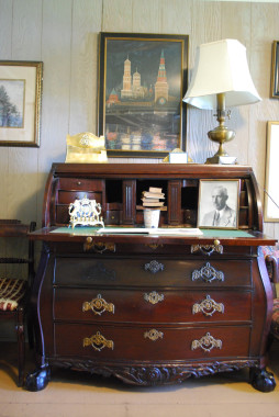 Victorian Bowed Roll-Top Desk.
Made during the Napoleonic wars, this eighteenth century Victorian bowed roll-top desk was brought to Greenwood from Russia by Nobbs. Although he was born in Haddington Scotland, Percy spent most of his childhood in St. Petersburg, Russia, and returned several times as an adult. (Greenwood Collection)
