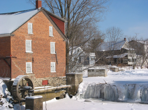 The oft-photographed Cornell Mill (2 River Street) is a beautiful sight in any season. Note the water wheel to the left of this photo. This is a replica of the original wheel that once powered the gristmill.