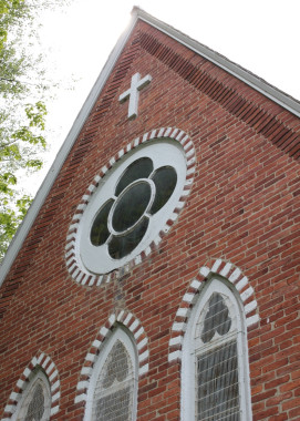 An example of the Gothic detail on St. James the Apostle Church. Others features of interest include the locally-produced red brick that is so typical of Missisquoi County; the original slate roof; and the fine woodwork on the church's interior.