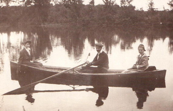 Boating and swimming in the mill pond above the dam on the Pike River was a popular pastime in days gone by. The boaters seen here were photographed around 1910.