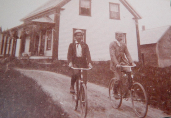 Photograph of Charles and John French, sons of John French and Emma Parsons, taken in front of the family farmhouse.
(Compton County Museum Collection)