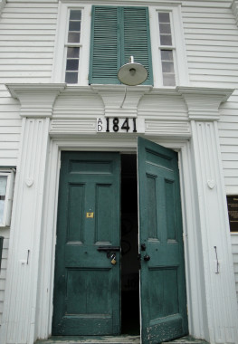 Front door, Compton County Museum.
The early settlers built their homes and churches the way they had learned how in New England. The Compton County Museum, formerly a Congregationalist Church built in 1841, was built in the Greek Revival style popular at the time. It resembles many Protestant churches built in Vermont and New Hampshire in the early 1800s. Note the heart-shaped trim on the pilasters, visible in this photograph.
(Photo - Jackie Hyman)