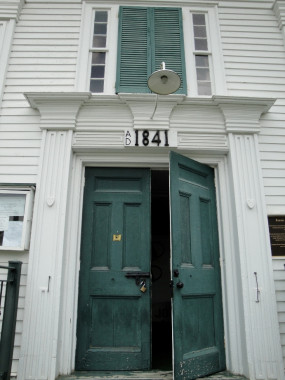 The heavily pilastered treatment of the front door of Eaton Corner's former Congregationalist Church is typical of the Greek Revival style. (Photo - CCHMS)
