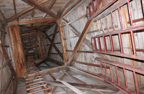 Adjacent to the Fessenden Room is the old fire tower. When the fire hall was still in use, this tower was used for drying hoses. Spotters could also climb to the top by means of a ladder to locate fires in the village. The tower's post and beam construction is interesting. (Photo - Matthew Farfan)