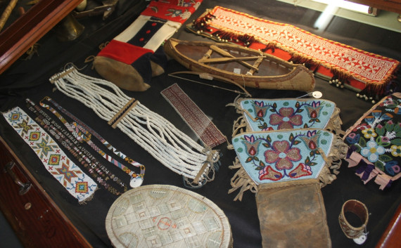 Also on display is a collection of rare early Native Indian objects, including clubs, cutting tools, arrow heads, beadwork, leatherwork, and more. (Photo - Matthew Farfan)