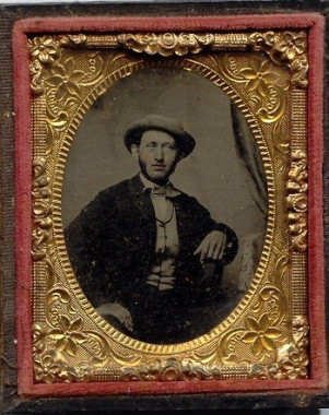 Photograph of Alexander Solomon Walbridge, c.1860. After the Patriotes were discovered in the Hiram Moore house, A. S. Walbridge decided to knock the door down with the butt of his rifle and capture the rebels instead of waiting for the arrival of the Canadian militia. To spur on the men to follow his lead, Walbridge shouted: "To hell with such a plan! We'll take them prisoners now and you may surround the house in the morning if you want to." (Missisquoi Historical Society Collections)