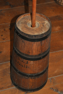 Butter churn, property of Hannah Lee Selby, c.1870.

Annice Selby of Dunham, Quebec, contributed to the family income by selling butter and pigs to neighbours and at the Cowansville market. The following are excerpts from her diary, 1934:

May 12. Churned butter and ploughed in morning, cleaned bucket room, cleaned leaves from flower beds.

May 19. Got up at 4 o'clock. Emily and I churned and ironed. Put out pigs and put up hen yard.

May 21. Churned all morning, cleaned house, baked and sewed.


