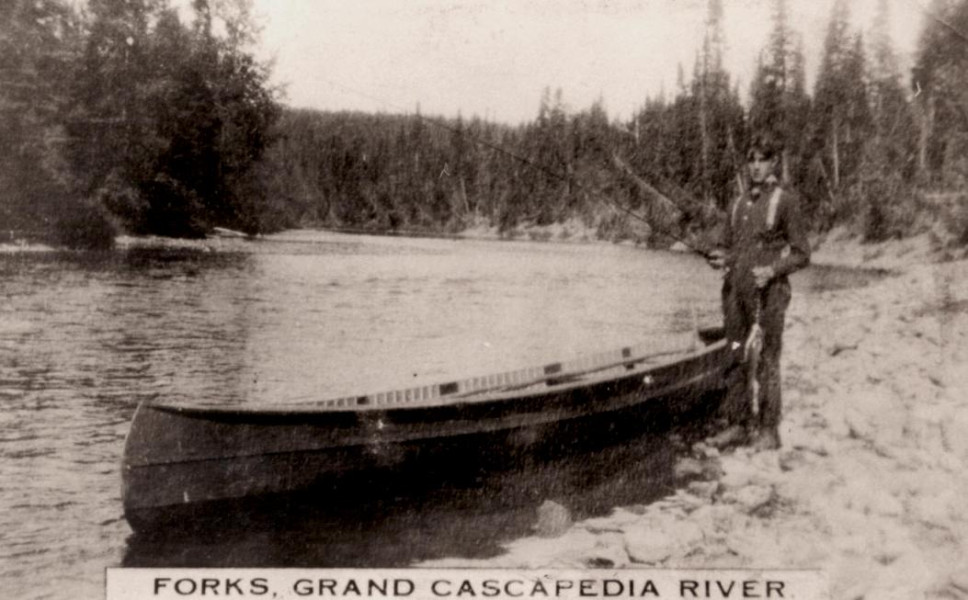 Photographic postcard, c.1930, showing fisherman Arthur Campbell at the Forks of the Cascapedia River. (Photo - Cascapedia River Museum Collection)