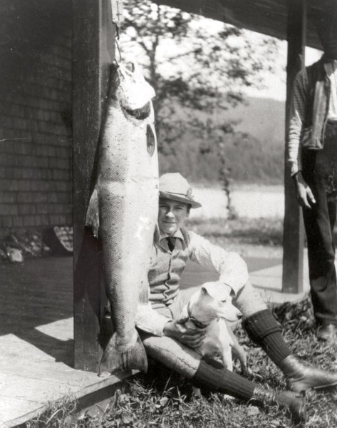 Edmund and Maria Davis' son Steuart, with their dog, Mixer. (Photo - Cascapedia River Museum Collection) 
