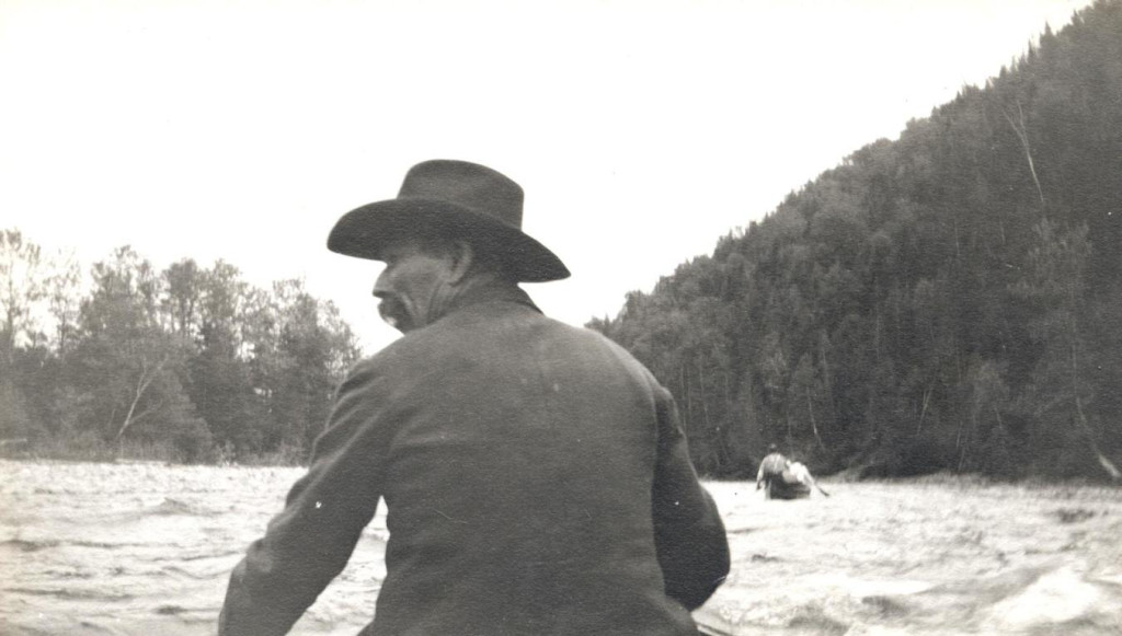 Canoeing down the Cascapedia, early 20th century. Heading up river on a fishing trip, fishermen never knows what to expect. Throughout the year, the river reacts to the weather, causing floods in the spring and low water conditions for in August.  (Photo - Cascapedia River Museum Collection)