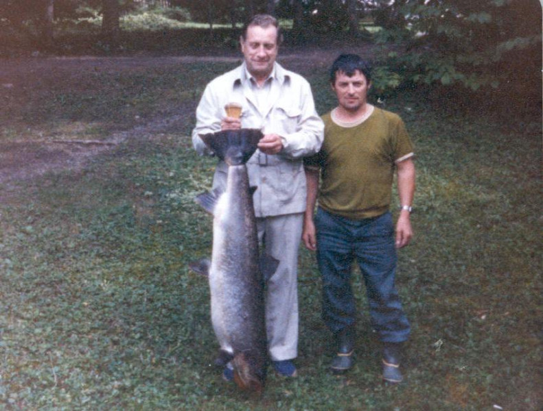 Sonny Rainville (left) of Montreal, owner of the New Derreen Camp, with his guide, Raymond Parent. The fish weighed in at 46 pounds. (Photo - Cascapedia River Museum Collection)