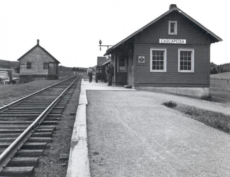 The train station, seen here c.1940s, was situated across from the Cascapedia Hotel and was a gathering place for the community. (Photo - Cascapedia River Museum)