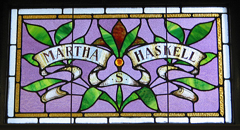 Stained glass windows in the reading room memorialize Col. Haskell's parents and grandparents. This one was dedicated to library co-founder Martha Haskell. (Photo - Matthew Farfan)