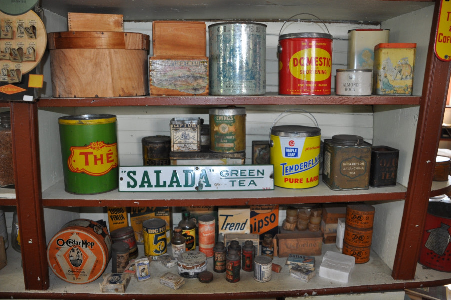 Items from Hodge's General Store, Stanbridge East, c.1930s-1940s. 
It is often assumed that our ancestors lived a very restricted life with few luxury goods. The Missisquoi ledgers confirm that customers bought apples, potatoes and turnips, rum, gun powder and tallow; but they could also buy velvet, expensive green tea and spices, port wine and brandy, a large variety of cloth including silk, scholarly books, window panes and even chocolate. (Missisquoi Historical Society Collections)