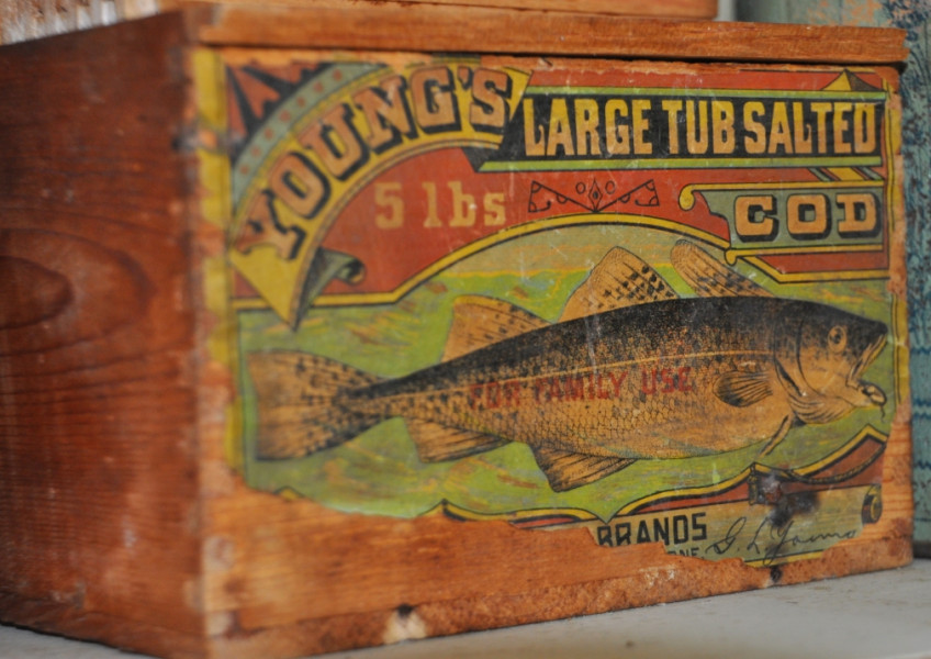 Box of dried and salted cod from Hodge's Store.
It was not unusual for customers to barter cod fish, mackerel, eggs and butter for store items such as cloth, chocolate, rum and gin. (Missisquoi Historical Society Collections)