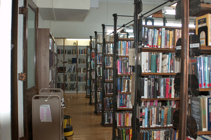 In 2009, the Haskell's international board of trustees abolished the library's century-old 2-cent per day late-book fee. The stacks at the Haskell are located entirely in Canada. (Photo - Haskell Free Library)