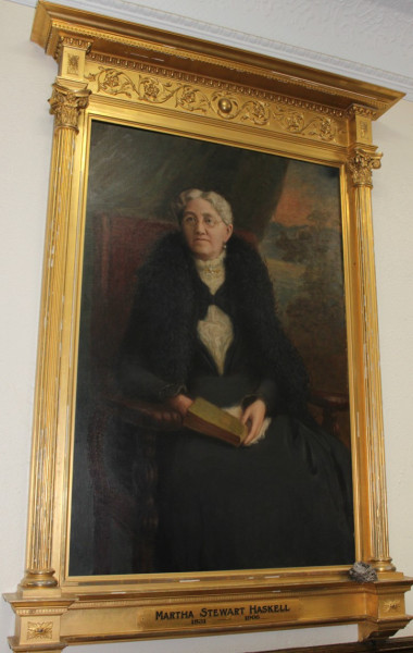 Martha Stewart Haskell (1831-1906), the grande dame of Derby Line, Vermont, co-founded the Haskell Free Library and Opera House with her son, Col. Horace Stewart Haskell. Through her parents, Horace Stewart and Catherine Hinman, of Beebe Plain, Quebec, and her husband, businessman Carlos Haskell, who died in a tragic accident at a young age, Martha Haskell inherited a considerable fortune. It was her idea to establish a public library and opera house for the benefit of the border communities, which, accordi